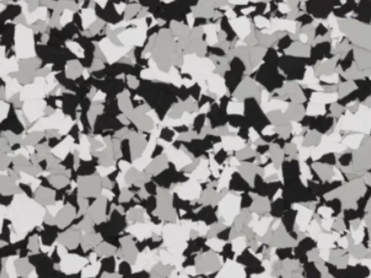 Domino common flake epoxy flooring sample by Stryke Resin.